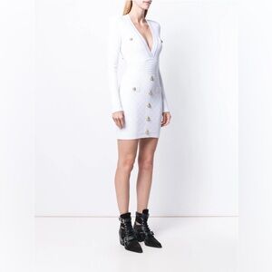 Balmain
Button embellished quilted dress